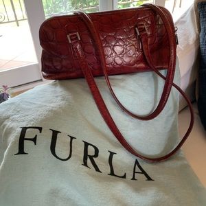 Red embossed Furla bag